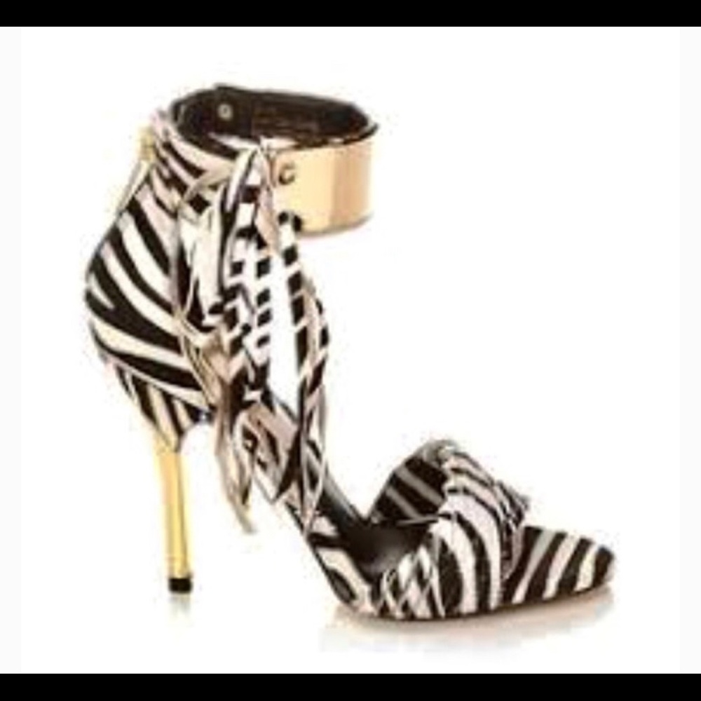 June Ambrose, Zebra size 7 sandals.